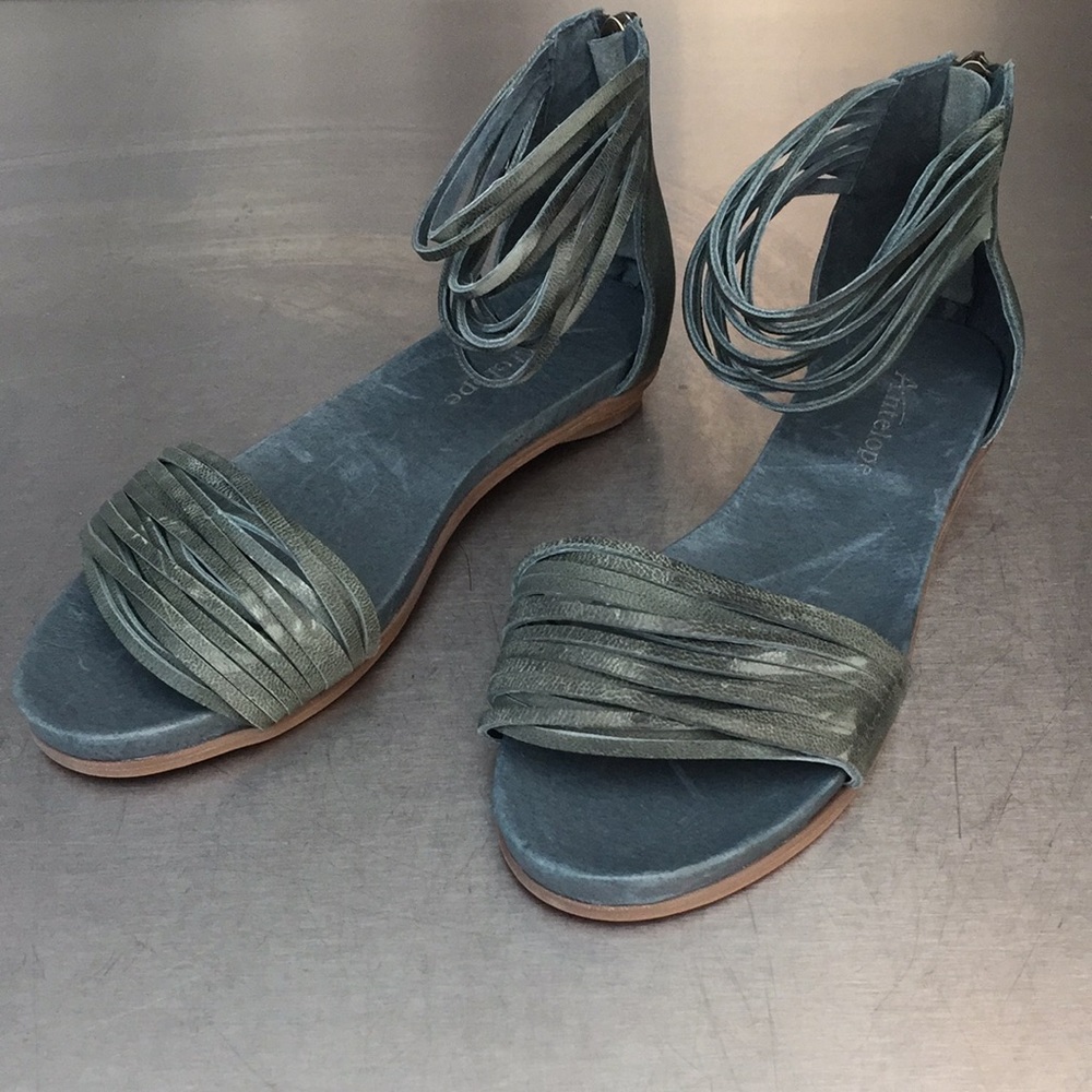 Teal leather strap sandals by Antelope Collection.